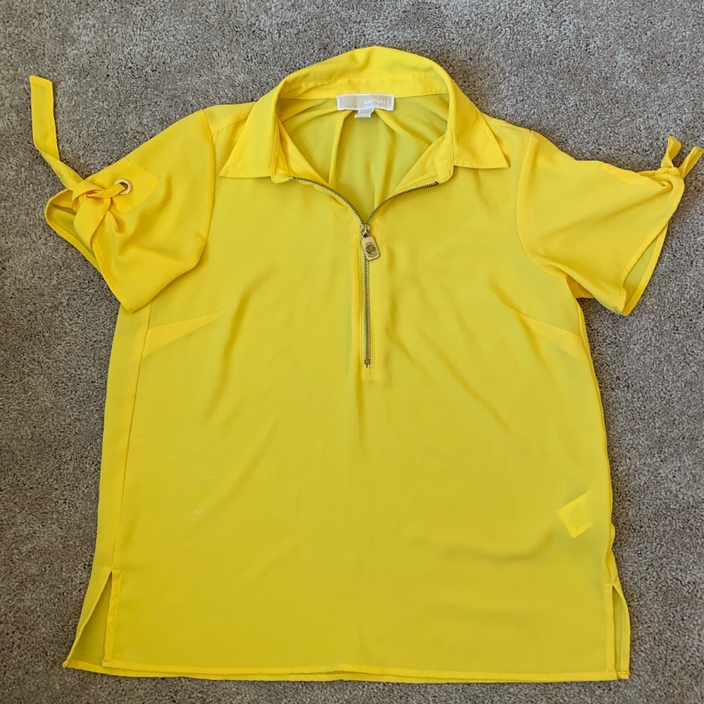 Woman’s Michael Kors yellow zipper front blouse